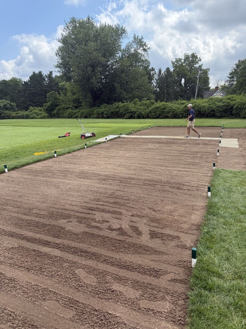 Turfgrass trial plots being staked out and prepared