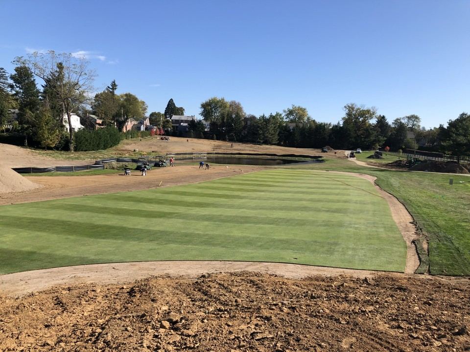 Green complex grow-in with new pond and drainage work taking shape in the background